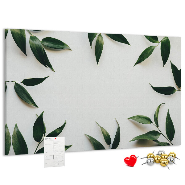 Tableau en liège Feuilles disposées dans un arrangement délicat et minimaliste