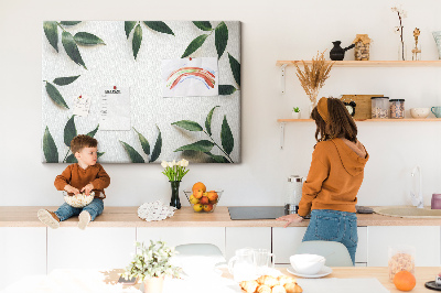 Tableau en liège Feuilles disposées dans un arrangement délicat et minimaliste