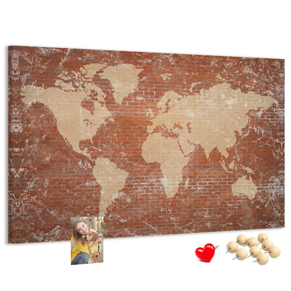 Tableau affichage liège Une carte du monde contre un mur de briques