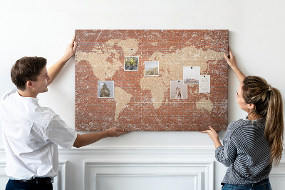 Tableau affichage liège Une carte du monde contre un mur de briques