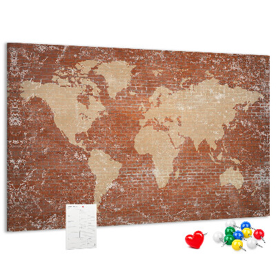 Tableau affichage liège Une carte du monde contre un mur de briques