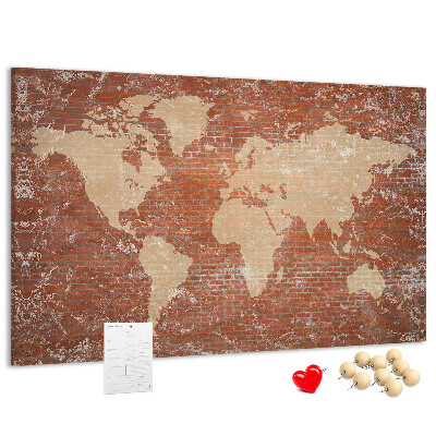 Tableau affichage liège Une carte du monde contre un mur de briques