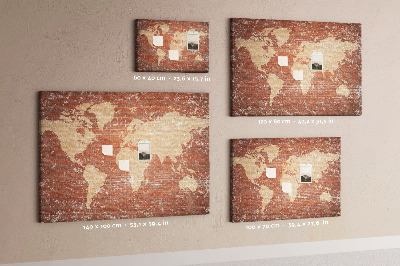 Tableau affichage liège Une carte du monde contre un mur de briques
