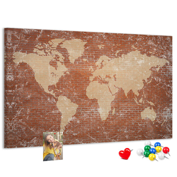 Tableau affichage liège Une carte du monde contre un mur de briques