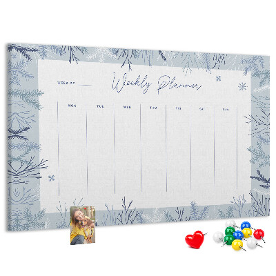 Tableau de liège Plan de semaine d'hiver avec un motif délicat.