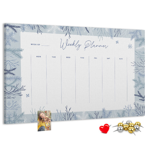 Tableau de liège Plan de semaine d'hiver avec un motif délicat.