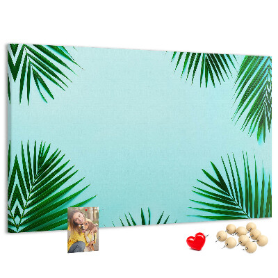 Tableau en liège Feuilles tropicales sur fond bleu