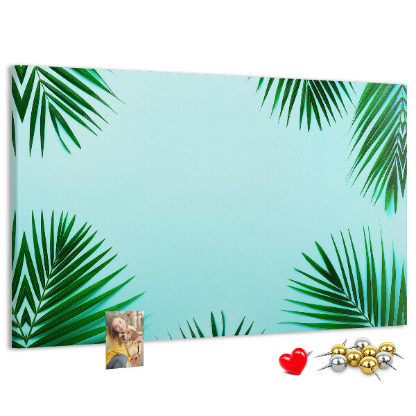 Tableau en liège Feuilles tropicales sur fond bleu
