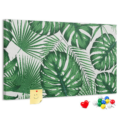 Tableau en liège De nombreuses feuilles de plantes tropicales en vert