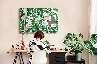 Tableau en liège De nombreuses feuilles de plantes tropicales en vert