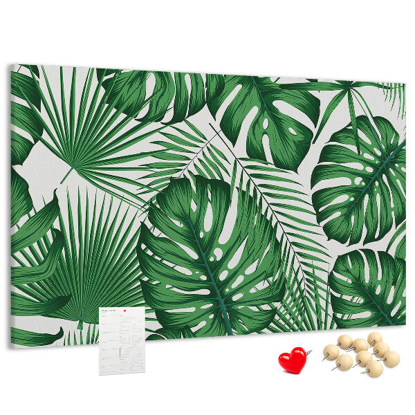 Tableau en liège De nombreuses feuilles de plantes tropicales en vert