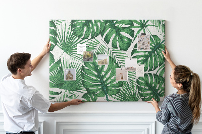 Tableau en liège De nombreuses feuilles de plantes tropicales en vert