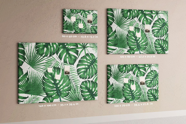 Tableau en liège De nombreuses feuilles de plantes tropicales en vert