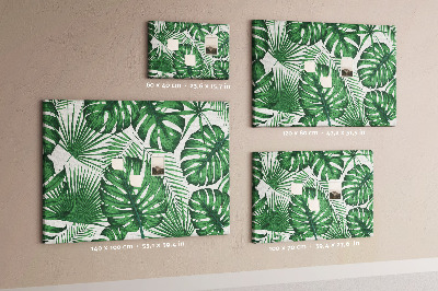 Tableau en liège De nombreuses feuilles de plantes tropicales en vert