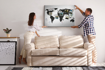 Tableau en liège Le contour noir d'une carte du monde sur le mur