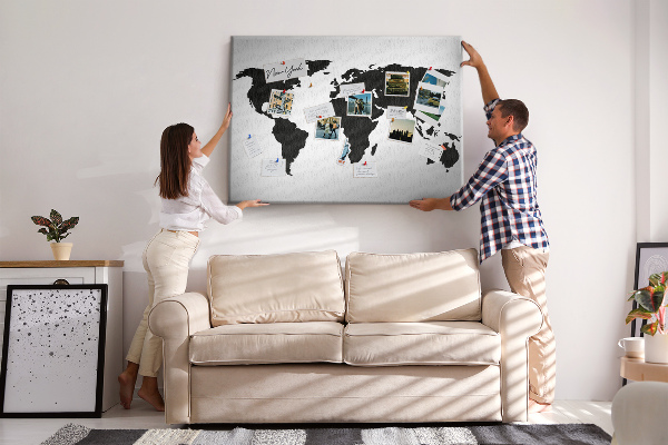 Tableau en liège Le contour noir d'une carte du monde sur le mur
