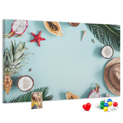 Tableau en liège Fruits tropicaux et accessoires de plage.