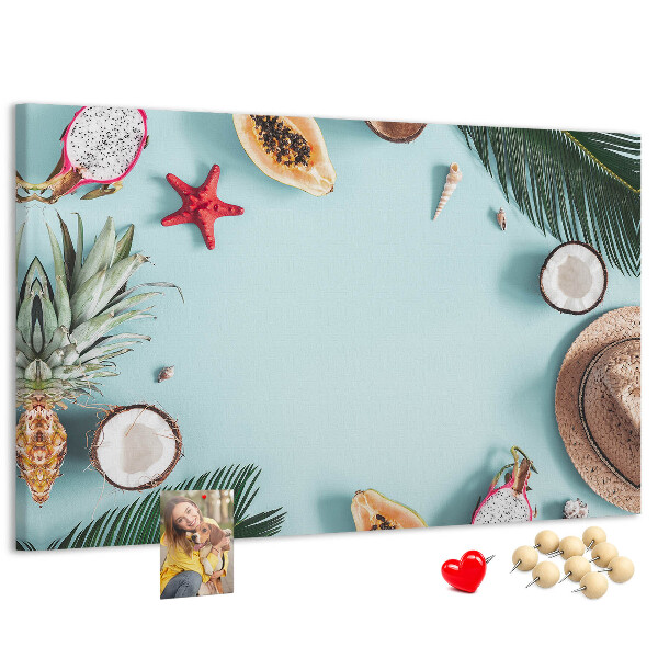 Tableau en liège Fruits tropicaux et accessoires de plage.