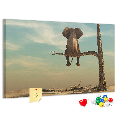 Tableau affichage liège Un éléphant sur une branche dans un paysage désertique
