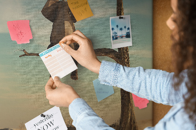 Tableau affichage liège Un éléphant sur une branche dans un paysage désertique