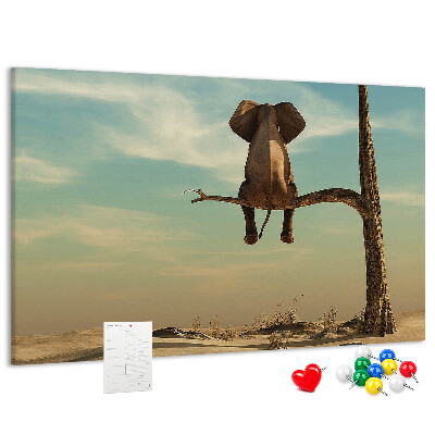Tableau affichage liège Un éléphant sur une branche dans un paysage désertique