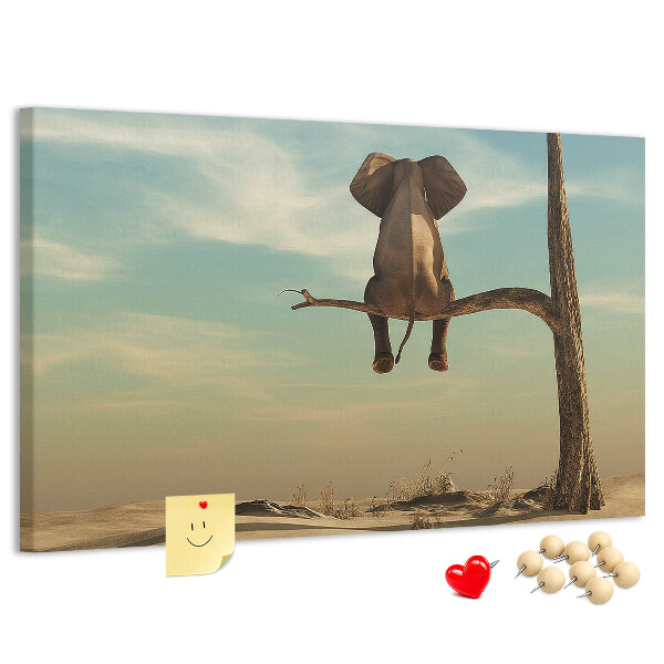Tableau affichage liège Un éléphant sur une branche dans un paysage désertique