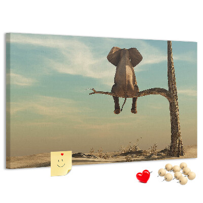 Tableau affichage liège Un éléphant sur une branche dans un paysage désertique
