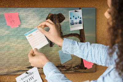 Tableau affichage liège Un éléphant sur une branche dans un paysage désertique