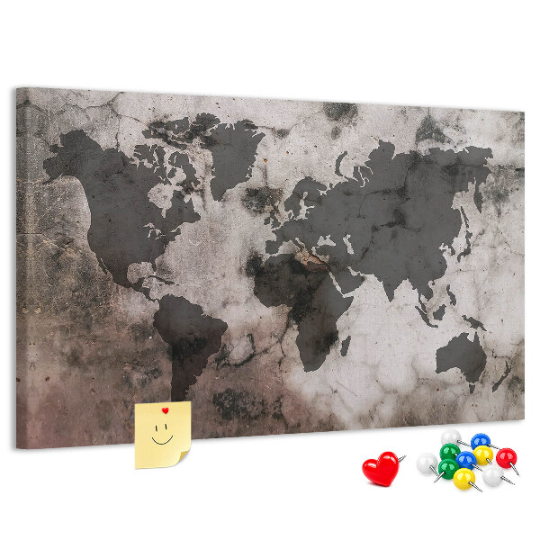 Tableau en liège Une carte du monde rouillée sur fond de béton