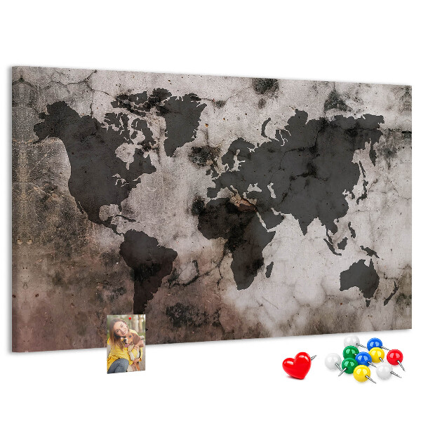 Tableau en liège Une carte du monde rouillée sur fond de béton