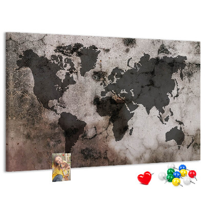 Tableau en liège Une carte du monde rouillée sur fond de béton