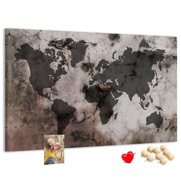 Tableau en liège Une carte du monde rouillée sur fond de béton