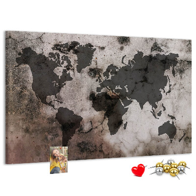 Tableau en liège Une carte du monde rouillée sur fond de béton
