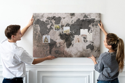 Tableau en liège Une carte du monde rouillée sur fond de béton