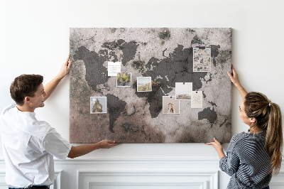 Tableau en liège Une carte du monde rouillée sur fond de béton