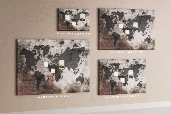 Tableau en liège Une carte du monde rouillée sur fond de béton