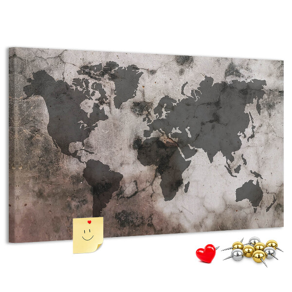 Tableau en liège Une carte du monde rouillée sur fond de béton