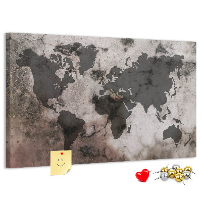 Tableau en liège Une carte du monde rouillée sur fond de béton