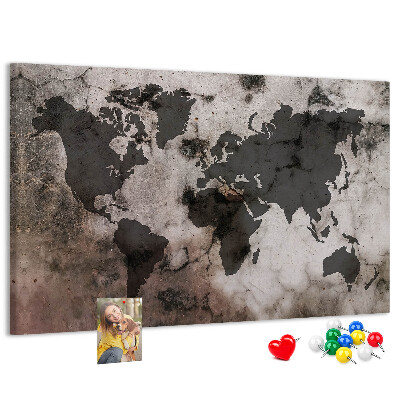 Tableau en liège Une carte du monde rouillée sur fond de béton