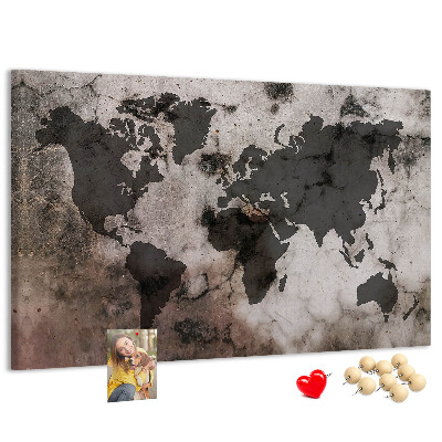 Tableau en liège Une carte du monde rouillée sur fond de béton