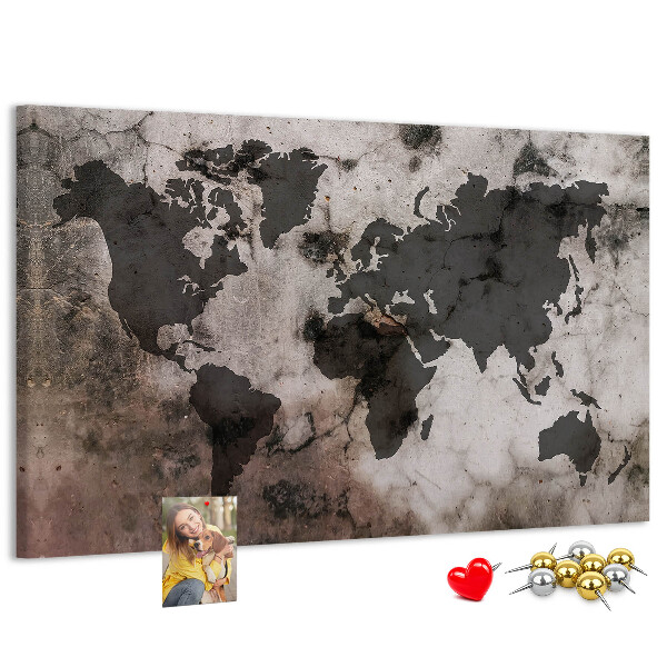 Tableau en liège Une carte du monde rouillée sur fond de béton