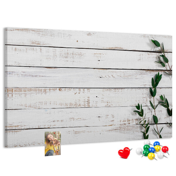 Tableau de liège Bois rustique avec des branches vertes