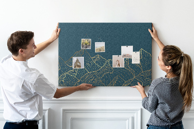 Tableau affichage liège Des contours dorés de montagnes sur un fond sombre