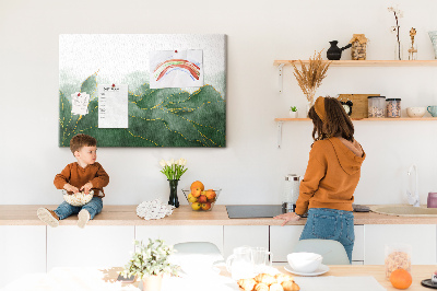 Tableau en liège Des touches dorées sur des feuilles vertes