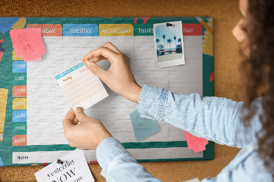Tableau en liège Un planning hebdomadaire créatif avec des touches de couleur