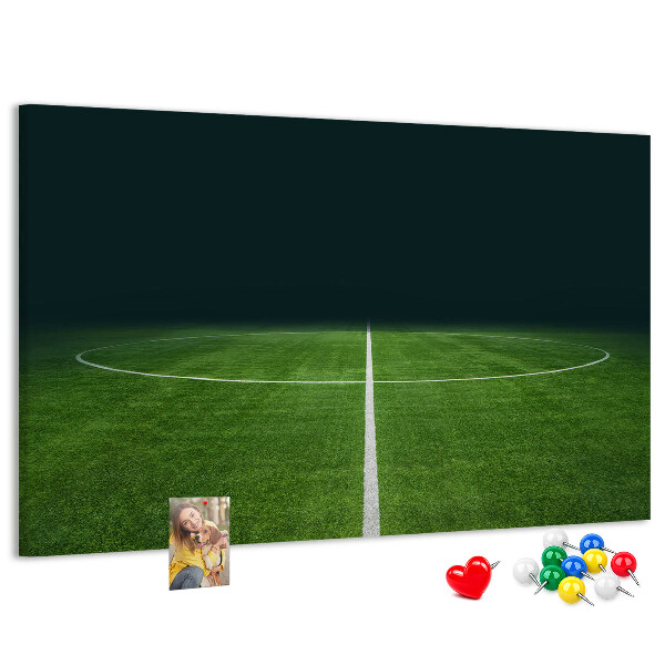 Tableau de liège Terrain de football avec lignes et gazon.