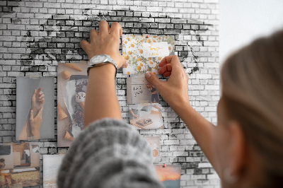 Tableau en liège Carte du monde sur un mur de briques