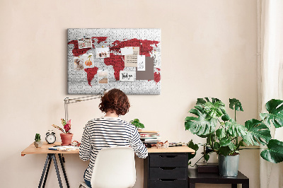 Tableau affichage liège Contour rouge du monde sur un mur de briques