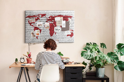 Tableau affichage liège Contour rouge du monde sur un mur de briques