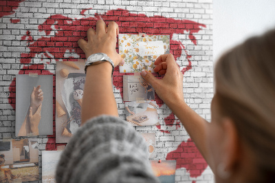 Tableau affichage liège Contour rouge du monde sur un mur de briques